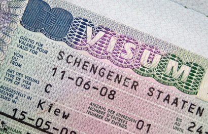 Close-up page of passport with Schengen visa