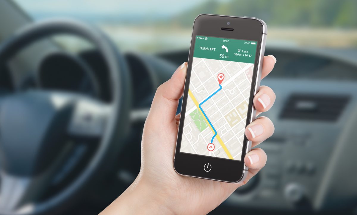 Smart phone with map gps navigation application on the screen