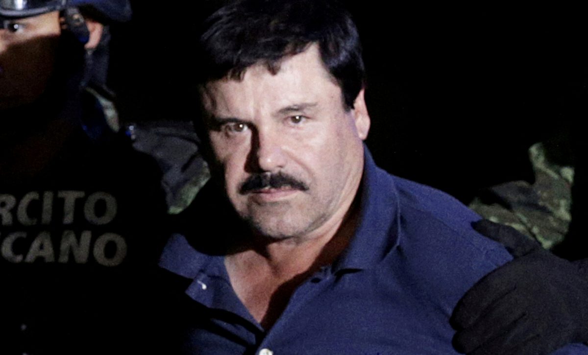 FILE PHOTO: FILE PHOTO: Recaptured drug lord Joaquin "El Chapo" Guzman is escorted by soldiers at the hangar belonging to the office of the Attorney General in Mexico City