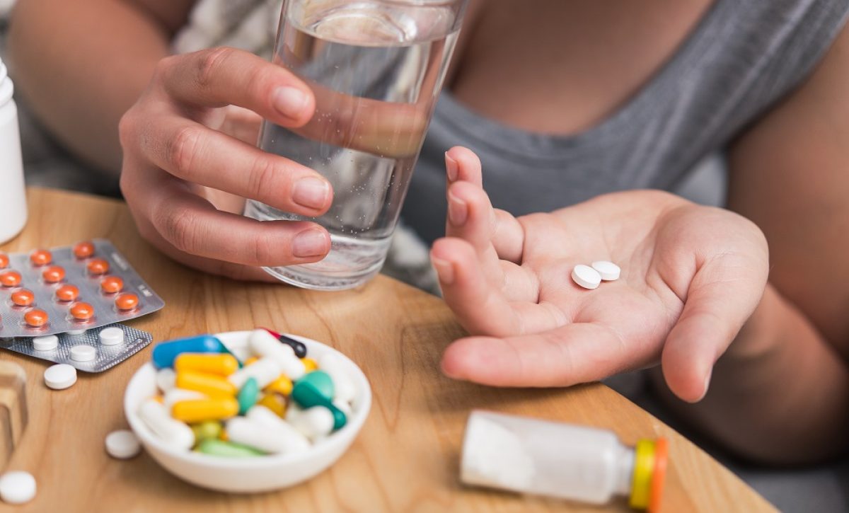 Young,Woman,Sick,With,Colds,And,Flu,,Self-medication,At,Home