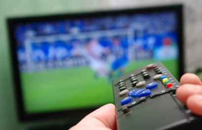 depositphotos_7914727-stock-photo-football-match-and-remote-control