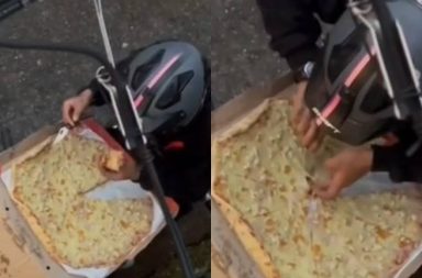 A un repartidor lo captaron disfrutando de una rebanada de pizza que estaba destinada a un cliente en México.