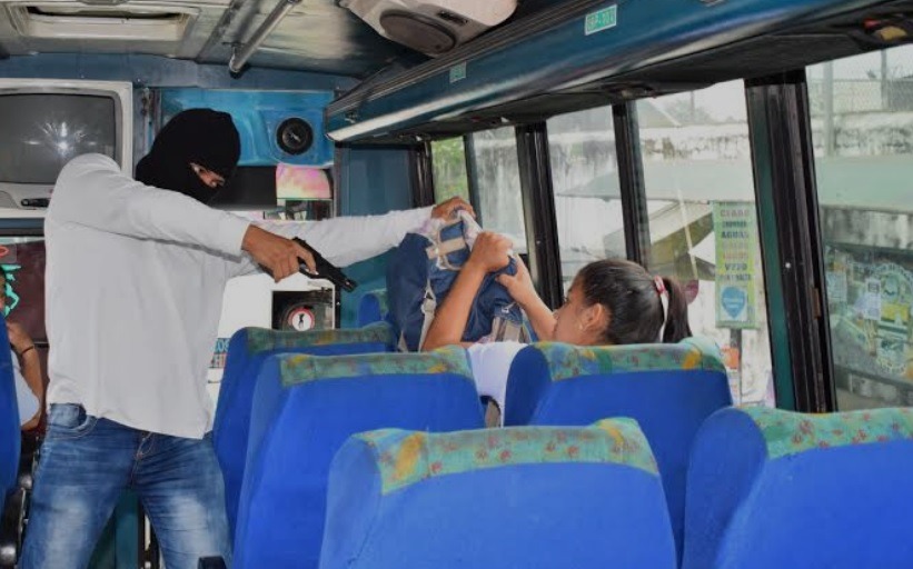 Delincuentes armados asaltan bus de la cooperativa Santo Domingo