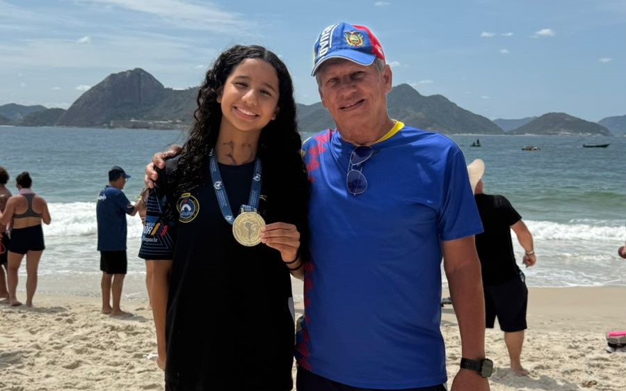 Uma Córdova junto a su entrenador Ramón del Toro.