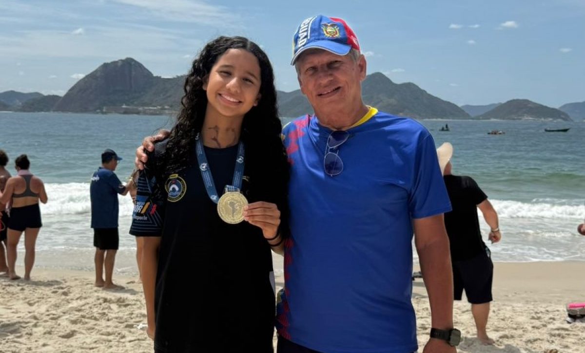 Uma Córdova junto a su entrenador Ramón del Toro.