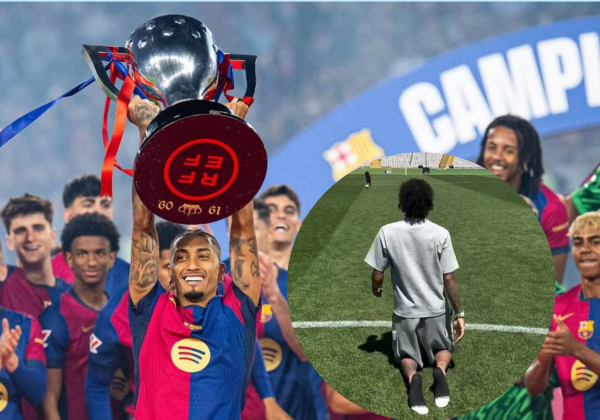 Raphinha cruza de rodillas el césped del Estadio Olímpico tras ganar LaLiga